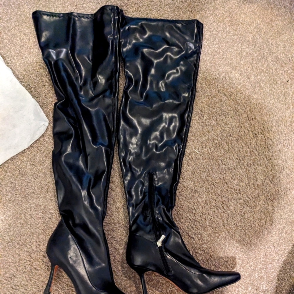 New York & company, black thigh high boot NWT. Size 8, includes dust bag, no box